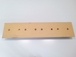 Contre lame de godet centrale reversible 8 trous en 1