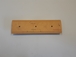 Contre lame de godet centrale reversible 3 trous en 1