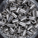 100 écrous crantés à inox A2 à tête plate à M6x16mm - SCELL-IT - END0630